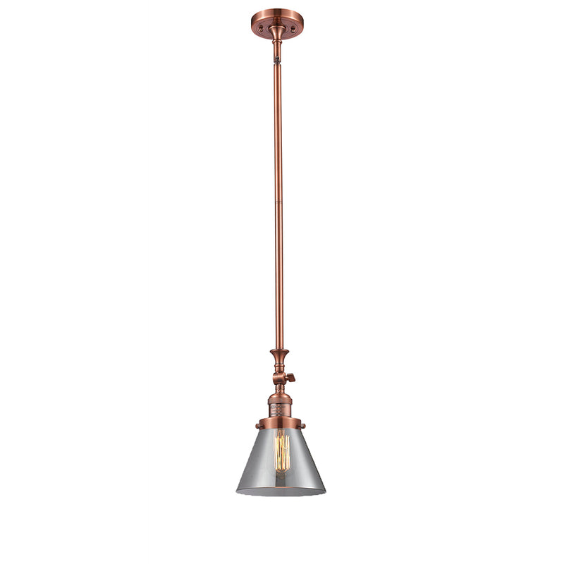 Cone Mini Pendant shown in the Antique Copper finish with a Plated Smoke shade