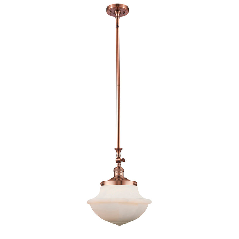 Oxford Mini Pendant shown in the Antique Copper finish with a Matte White shade