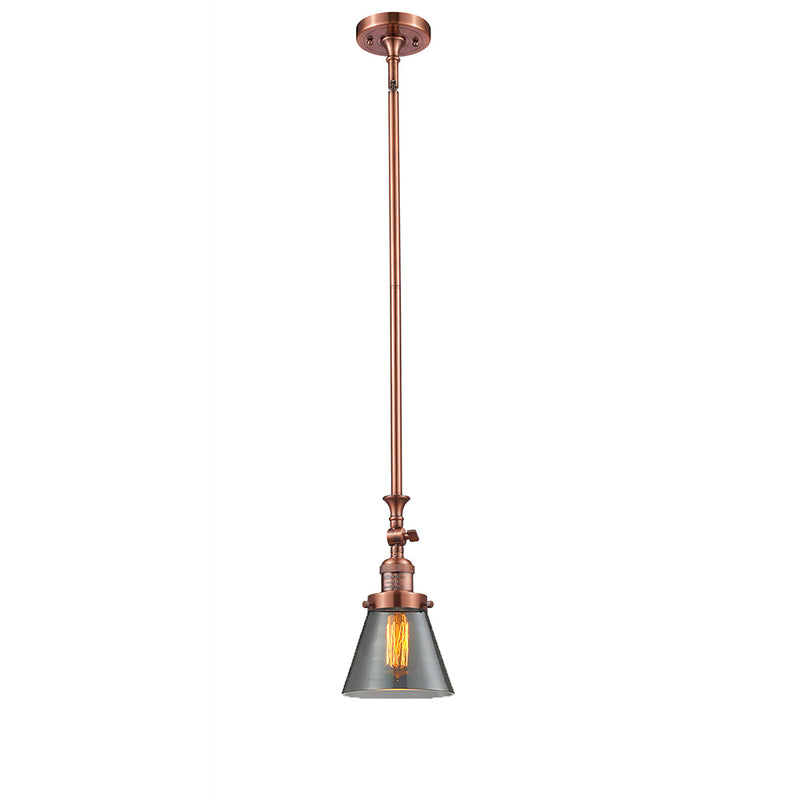 Cone Mini Pendant shown in the Antique Copper finish with a Plated Smoke shade