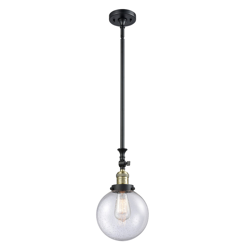 Beacon Mini Pendant shown in the Black Antique Brass finish with a Seedy shade