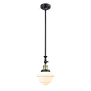 Oxford Mini Pendant shown in the Black Antique Brass finish with a Matte White shade