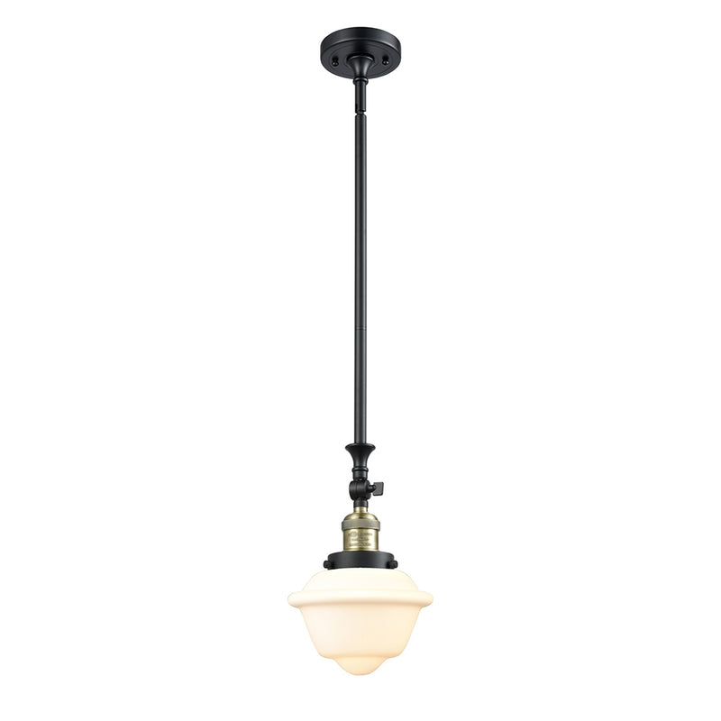 Oxford Mini Pendant shown in the Black Antique Brass finish with a Matte White shade