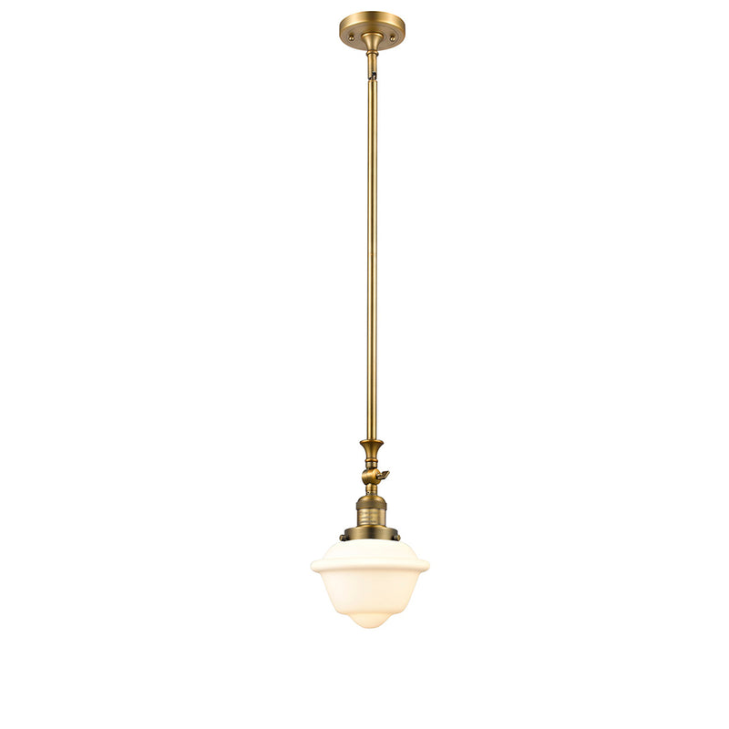 Oxford Mini Pendant shown in the Brushed Brass finish with a Matte White shade