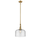 Bell Mini Pendant shown in the Brushed Brass finish with a Seedy shade