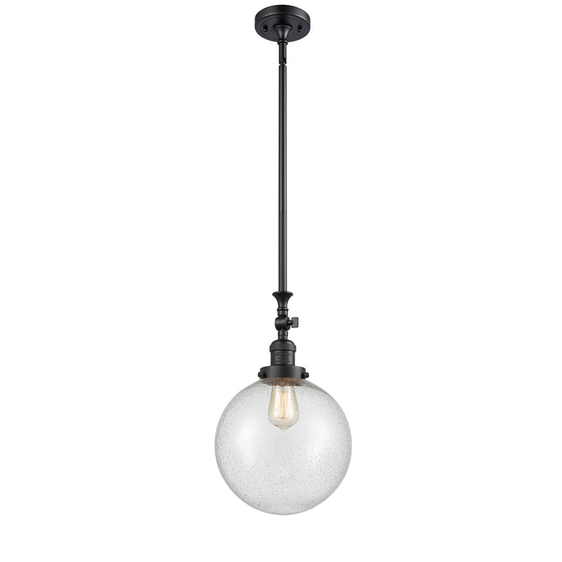 Beacon Mini Pendant shown in the Matte Black finish with a Seedy shade