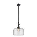 Bell Mini Pendant shown in the Matte Black finish with a Seedy shade