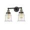 Canton Bath Vanity Light shown in the Black Antique Brass finish with a Clear shade