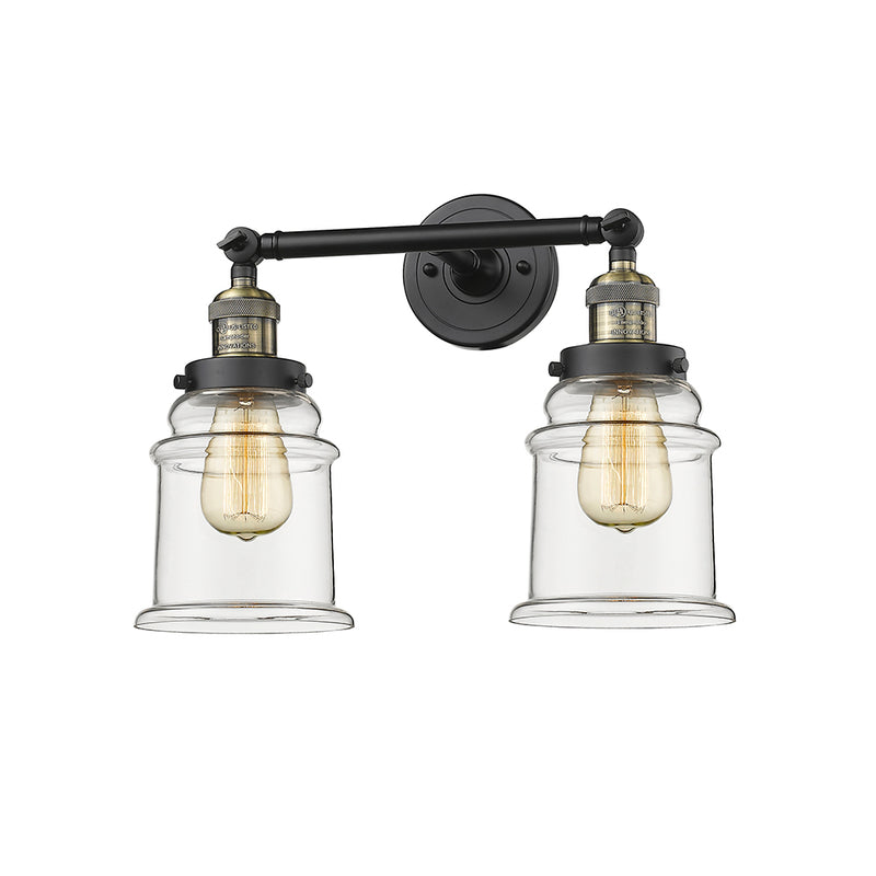 Canton Bath Vanity Light shown in the Black Antique Brass finish with a Clear shade