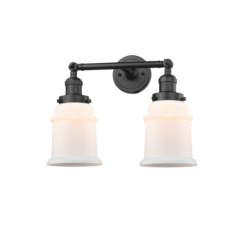 Canton Bath Vanity Light shown in the Oil Rubbed Bronze finish with a Matte White shade