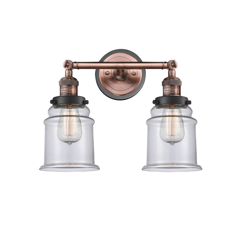 Canton Bath Vanity Light shown in the Antique Copper finish with a Clear shade