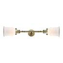 Canton Bath Vanity Light shown in the Antique Brass finish with a Matte White shade