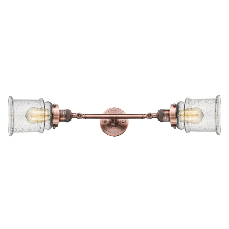 Canton Bath Vanity Light shown in the Antique Copper finish with a Seedy shade