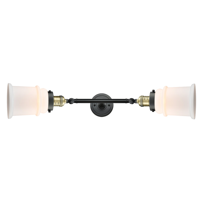 Canton Bath Vanity Light shown in the Black Antique Brass finish with a Matte White shade