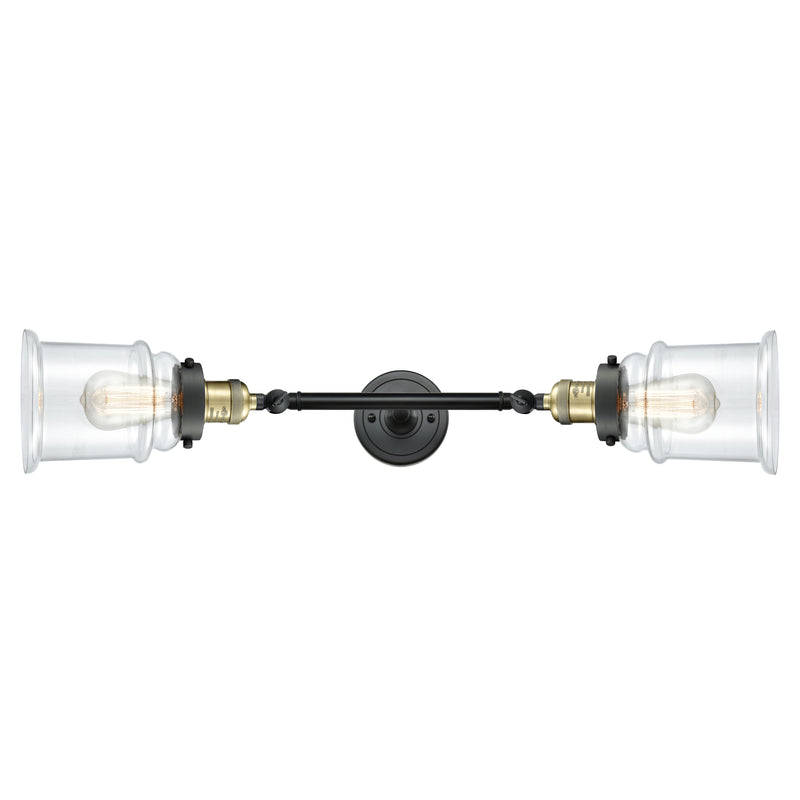 Canton Bath Vanity Light shown in the Black Antique Brass finish with a Clear shade