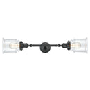 Canton Bath Vanity Light shown in the Matte Black finish with a Clear shade