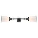 Canton Bath Vanity Light shown in the Oil Rubbed Bronze finish with a Matte White shade