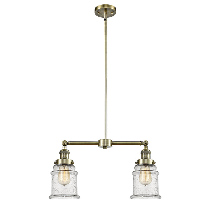 Canton Island Light shown in the Antique Brass finish with a Seedy shade