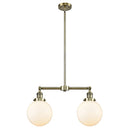 Beacon Island Light shown in the Antique Brass finish with a Matte White shade