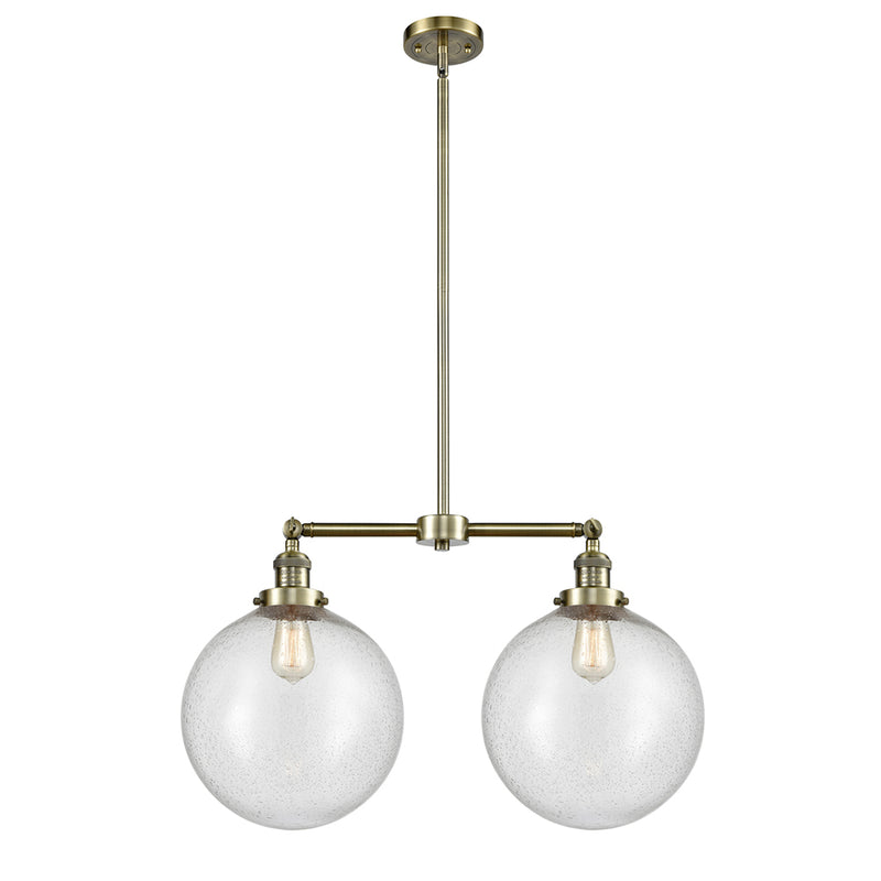 Beacon Island Light shown in the Antique Brass finish with a Seedy shade