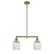 Colton Island Light shown in the Antique Brass finish with a Clear Halophane shade