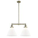 Cone Island Light shown in the Antique Brass finish with a Matte White shade