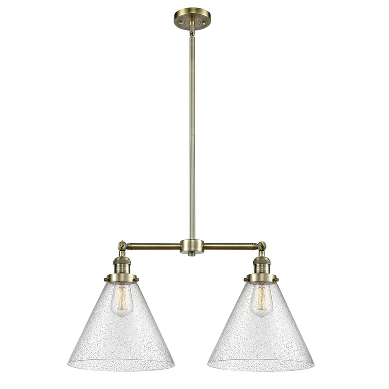 Cone Island Light shown in the Antique Brass finish with a Seedy shade