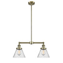 Cone Island Light shown in the Antique Brass finish with a Seedy shade