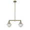 Oxford Island Light shown in the Antique Brass finish with a Clear shade