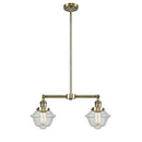 Oxford Island Light shown in the Antique Brass finish with a Seedy shade