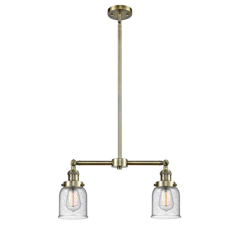 Bell Island Light shown in the Antique Brass finish with a Seedy shade