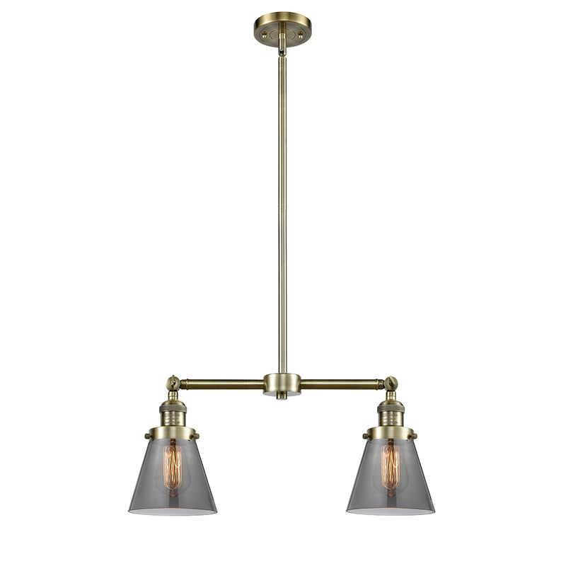 Cone Island Light shown in the Antique Brass finish with a Plated Smoke shade