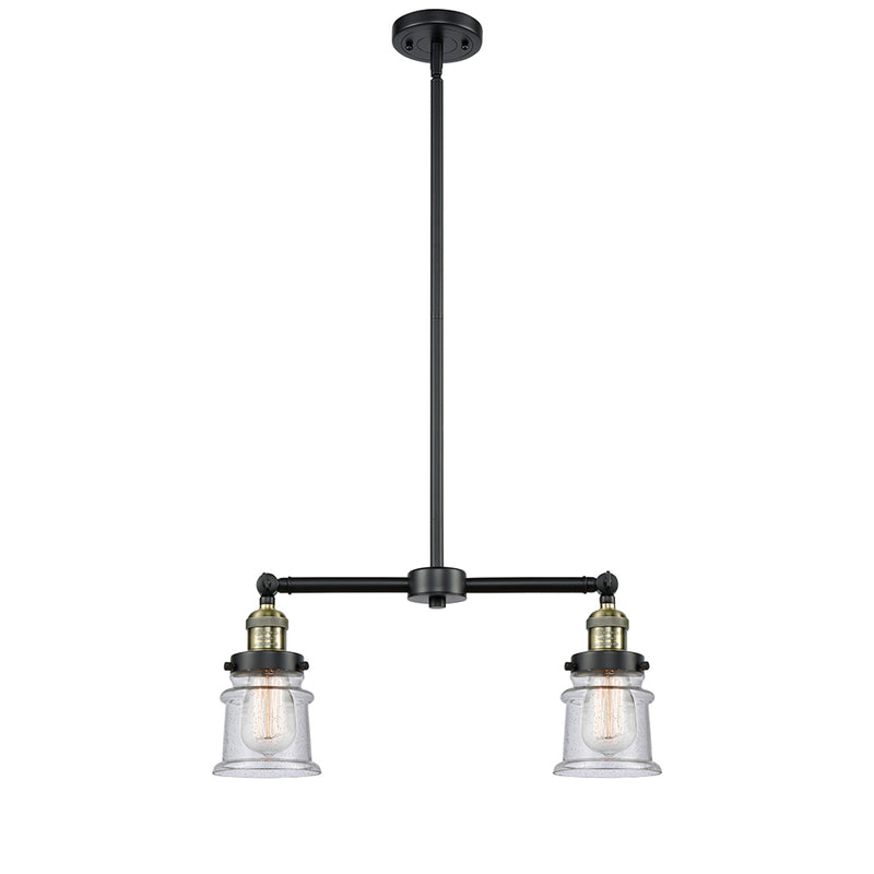 Canton Island Light shown in the Black Antique Brass finish with a Seedy shade