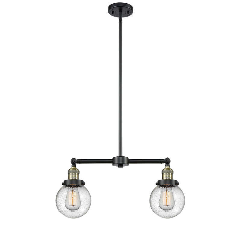 Beacon Island Light shown in the Black Antique Brass finish with a Seedy shade