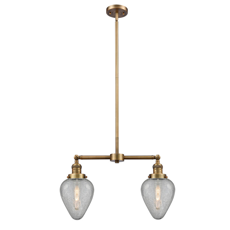 Geneseo Island Light shown in the Brushed Brass finish with a Clear Crackled shade