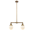 Beacon Island Light shown in the Brushed Brass finish with a Matte White shade