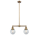 Beacon Island Light shown in the Brushed Brass finish with a Seedy shade