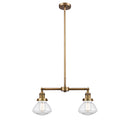 Olean Island Light shown in the Brushed Brass finish with a Clear shade