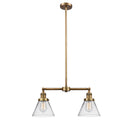 Cone Island Light shown in the Brushed Brass finish with a Clear shade