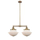 Oxford Island Light shown in the Brushed Brass finish with a Matte White shade