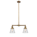 Cone Island Light shown in the Brushed Brass finish with a Clear shade