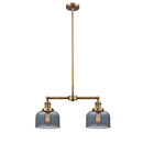 Bell Island Light shown in the Brushed Brass finish with a Plated Smoke shade