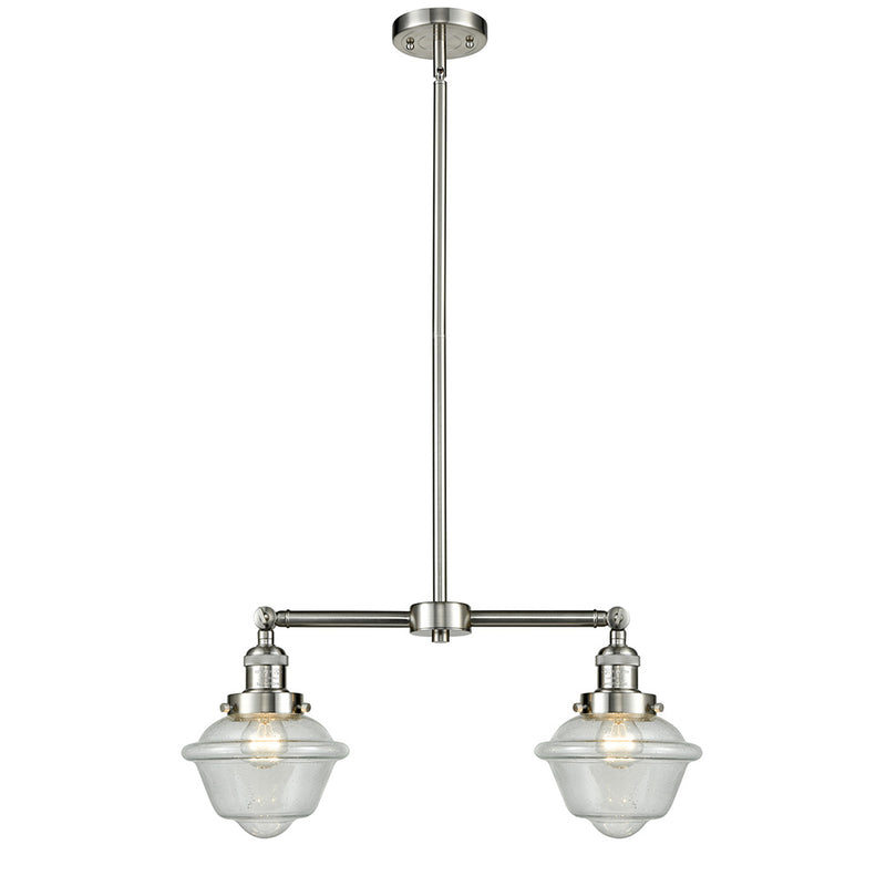 Oxford Island Light shown in the Brushed Satin Nickel finish with a Seedy shade