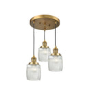 Colton Multi-Pendant shown in the Brushed Brass finish with a Clear Halophane shade