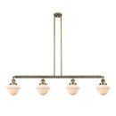 Oxford Island Light shown in the Antique Brass finish with a Matte White shade