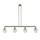 Oxford Island Light shown in the Antique Brass finish with a Clear shade