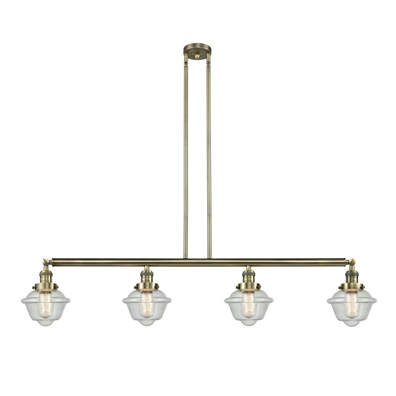 Oxford Island Light shown in the Antique Brass finish with a Seedy shade