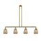 Chatham Island Light shown in the Brushed Brass finish with a Mercury shade