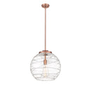 Deco Swirl Pendant shown in the Antique Copper finish with a Clear shade