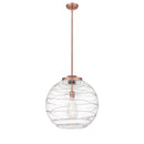 Deco Swirl Pendant shown in the Antique Copper finish with a Clear shade