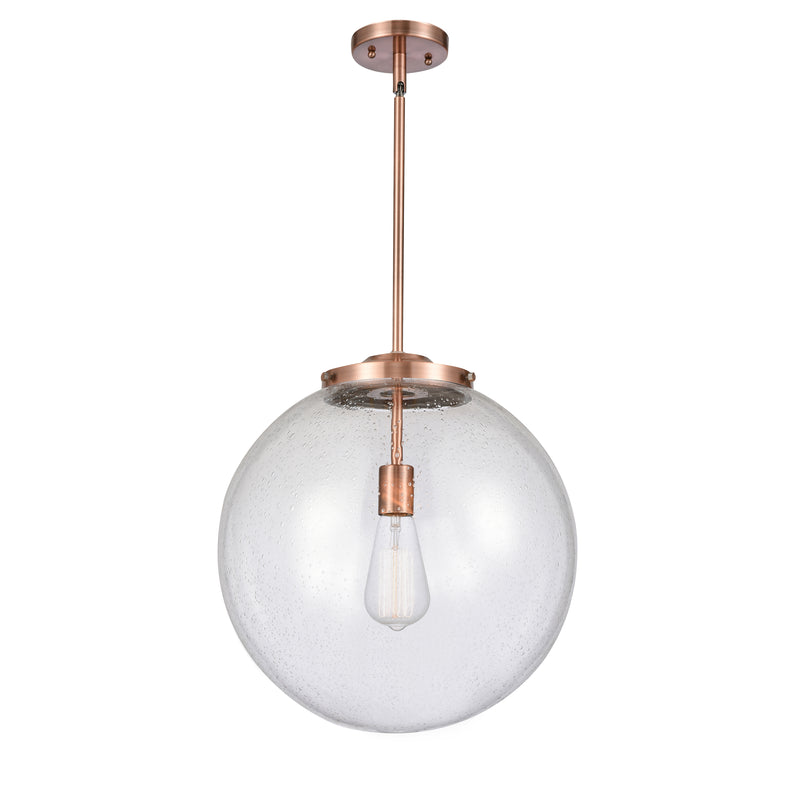 Beacon Pendant shown in the Antique Copper finish with a Seedy shade